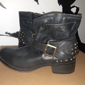 Black Steve Madden buckle bootie with spikes